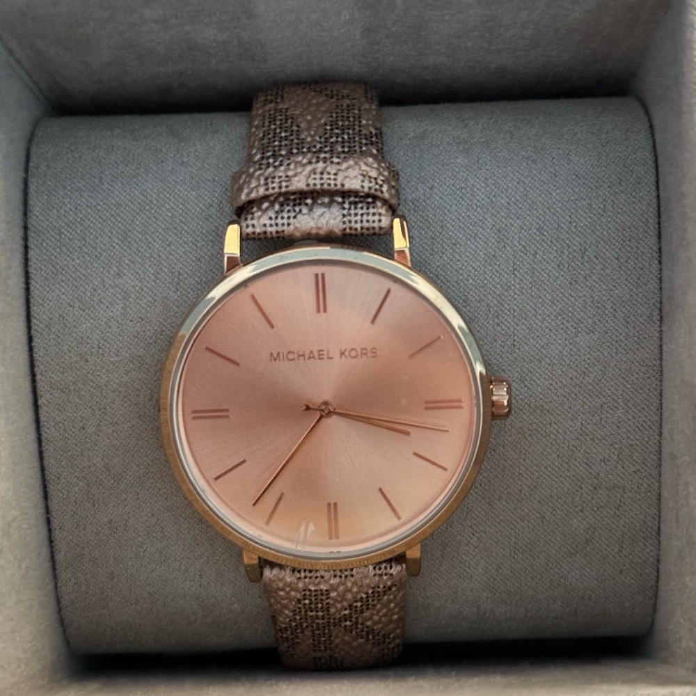 Brand new Michael Kors rose gold watch with MK band